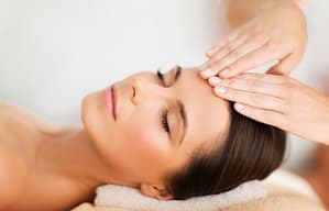 spa, resort, beauty and health concept - beautiful woman in spa