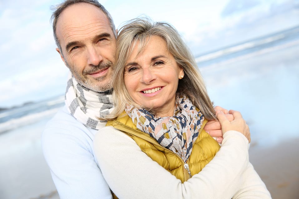 Portrait of loving senior couple at the beach